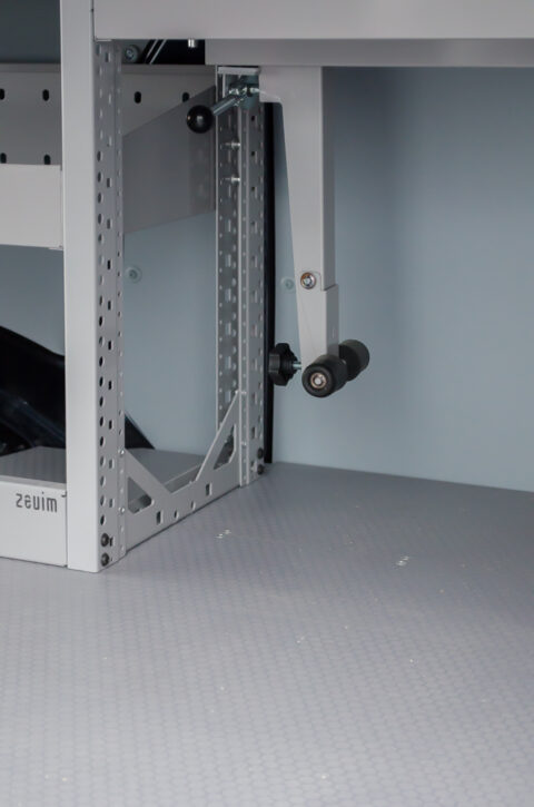 Zevim van racking system. Volkswagen Transporter L1H1. Vertical system, combined with bottom drawer system. Suitcase clip.